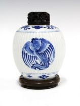 Chinese blue and white Phoenix pattern vase of ovoid form, with a foliate pierced cover and stand,