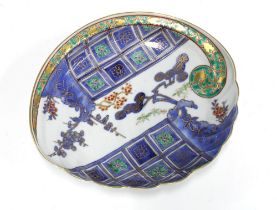 Arita porcelain scalloped edge bowl painted in coloured enamels with stylised motifs, blue flowers