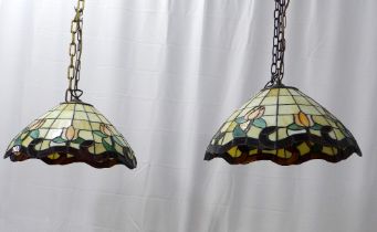 Pair of Tiffany style coloured and leaded glass hanging light shades, 43cm. (2)