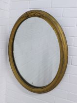 Gilt framed wall mirror with oval glass plate, 61 x 78cm. (a/f)