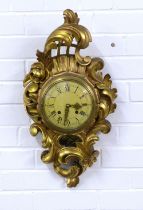 Gilt Cartel wall clock by Exacta of Sweden, 32 x 60cm.