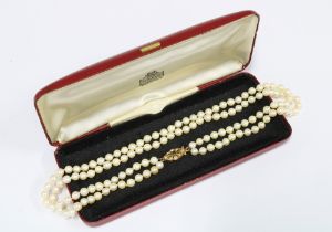 Double strand pearl necklace with a 9ct gold sapphire and seed pearl clasp, Birmingham 1975