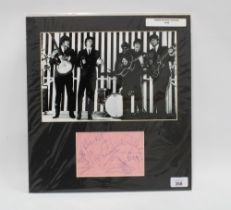 HERMAN'S HERMITS, set of autographs in blue ink, mounted in card with a black and white band