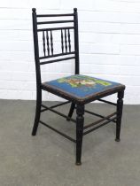 Child's ebonised Arts & Crafts chair, with a bunnykins style tapestry seat , 36 x 71 x 32cm.