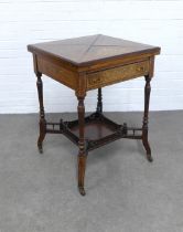Edwardian rosewood & marquetry envelope games table, the top opening to a green felt interior with