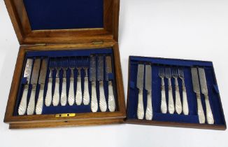 Walnut canteen containing a near complete set of mother of pearl handled fruit knives and forks,