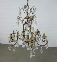 A large brass and glass chandelier, 67 x77cm.