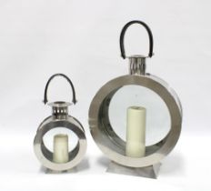 Two contemporary storm candle lights of circular form (2)