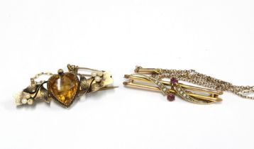 An Edwardian 15ct gold citrine and seed pearl brooch together with a 9ct gold gemset bar brooch on a