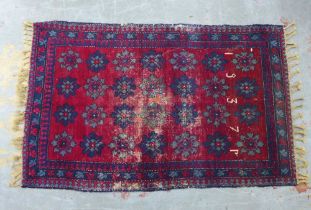 Early 20th century Armenian rug, dated 1937, red field with blue flowers, likely with later tassels,