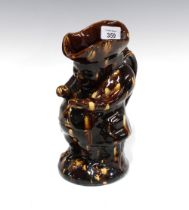 Treacle glazed toby jug, 24 x 18cm.