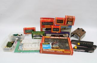 Box containing Hornby trains, track and models etc.