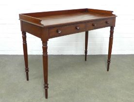 19th century mahogany writing table with three quarter gallery and two frieze drawers with bun