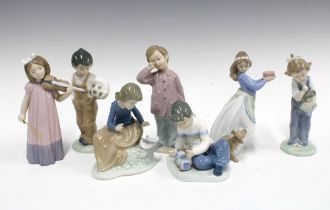 Seven various Nao porcelain figures (7) 19cm.