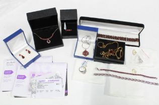A collection of silver gemset jewellery to include bracelets, earrings, necklaces and rings together