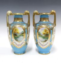 Pair of Noritake vases, early 20th century, tapering form with twin gilt handles, painted with swans
