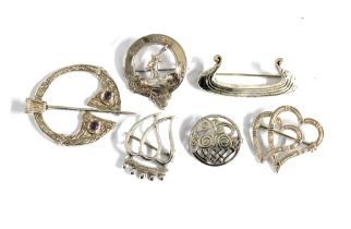 A group of Scottish silver brooches to include 'SANS TACHE' Napier clan brooch by Medlock & Craik of