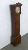 An early 20th century oak cased grandmother clock with silvered dial and arabic numerals, 28 x