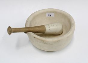 A large pestle and mortar, 22 x 12cm. (2)