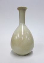 A chinoiserie white craquelure glazed bottle neck vase, 18.5cm high