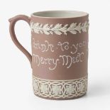 A Wedgwood Harry Barnard (1862-1933) Designed Lilac Dip Jasper Motto Mug UK, circa 1900