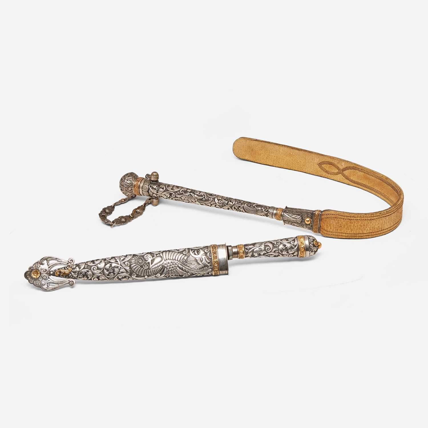 A repoussé silver and gold gaucho knife and flogger Heinrich Böker & Co. Arbolito S.A., Buenos