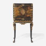 A Chinese Export gilt-decorated black lacquer table cabinet on a George I gilt-decorated and