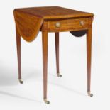 A George III oval inlaid mahogany and satinwood pembroke table circa 1780
