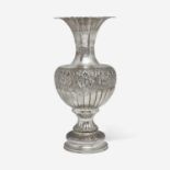 A large sterling silver floral repoussé vase late 19th / early 20th century
