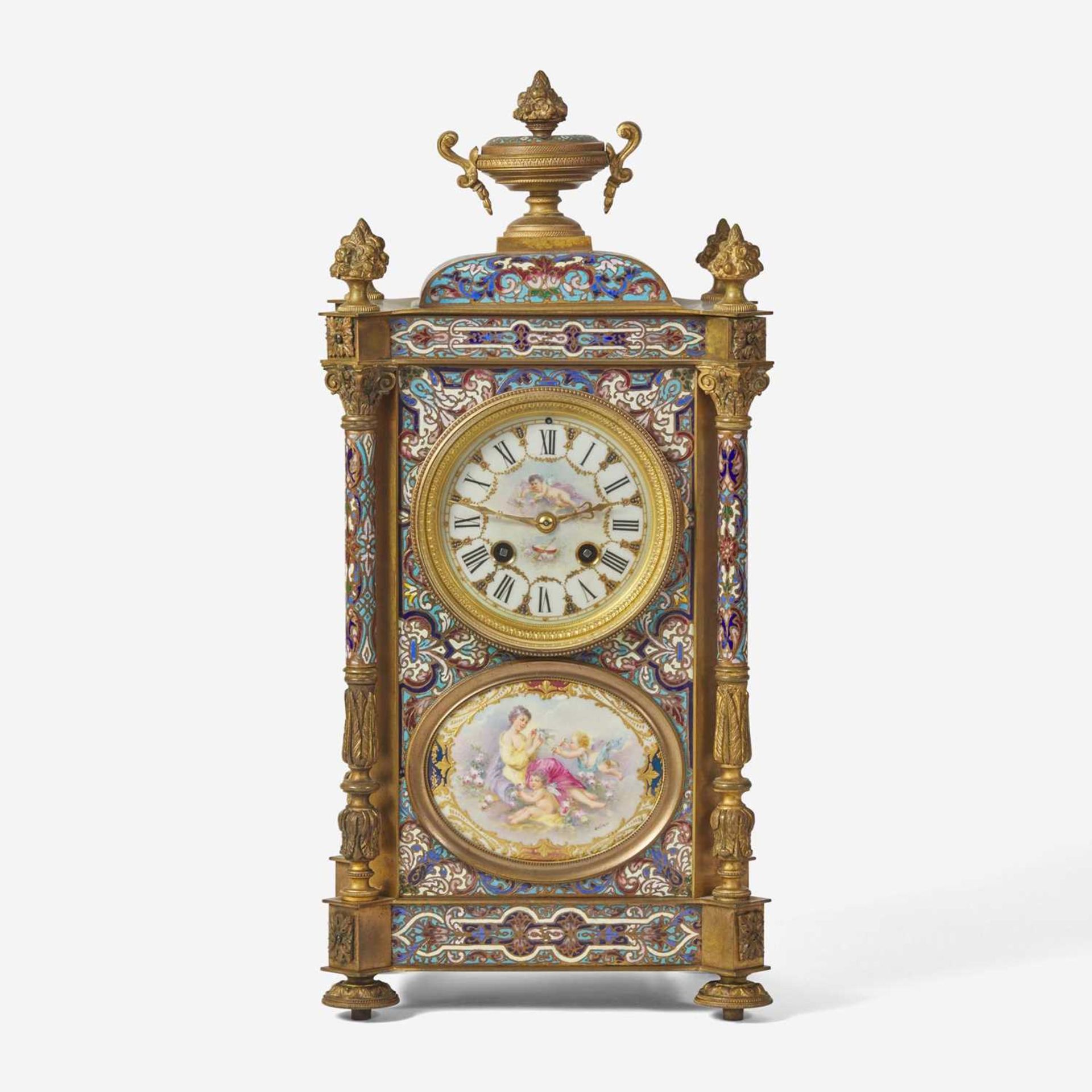 A French cloisonné enamel and gilt-bronze mounted mantel clock with painted porcelain set