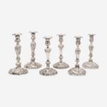 Three pairs of George III / Victorian weighted sterling silver candlesticks in the Rococo manner