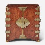 A Queen Anne brass-mounted burl yew table cabinet circa 1710