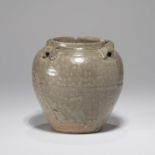 A SMALL CHINESE YUEYAO CELADON JAR