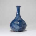 A KOREAN BLUE GLAZED 'FLOWER' BOTTLE VASE