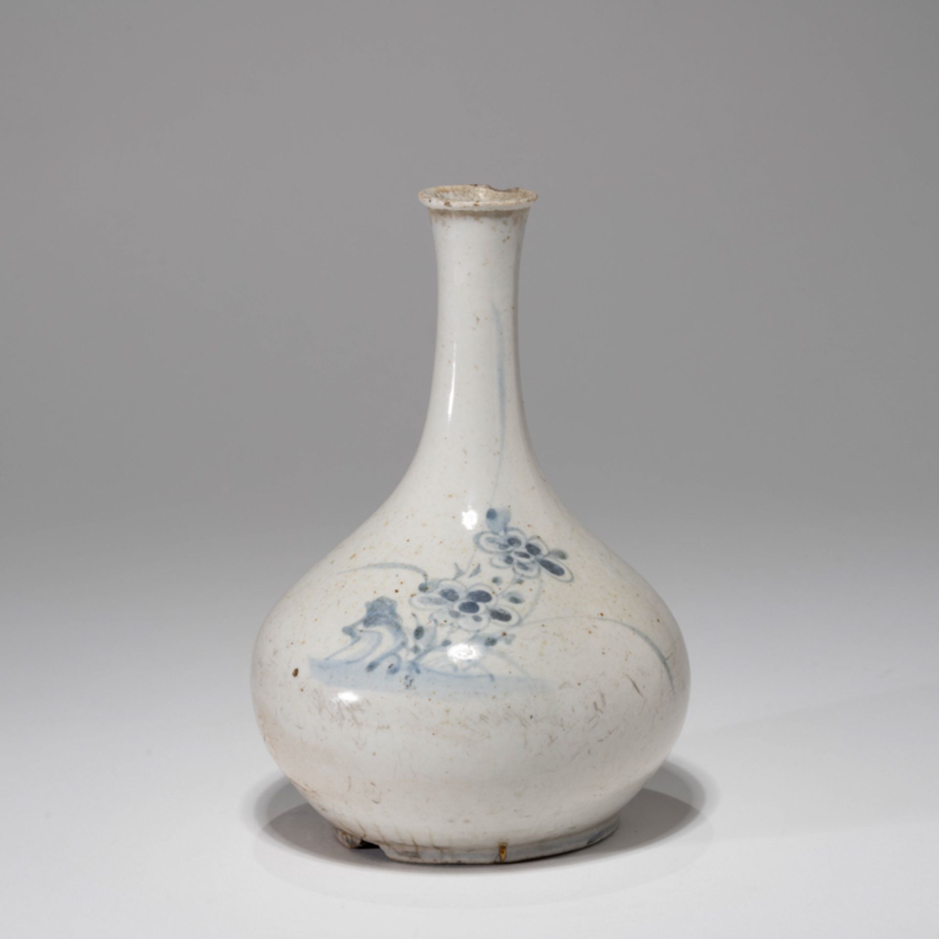 A KOREAN BLUE AND WHITE 'FLOWER' BOTTLE VASE, JOSEON DYNASTY