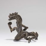 A CHINESE BRONZE DRAGON FORM SUPPORT