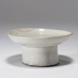 A KOREAN WHITE GLAZED HIGH-FOOTED DISH, JOSEON DYNASTY