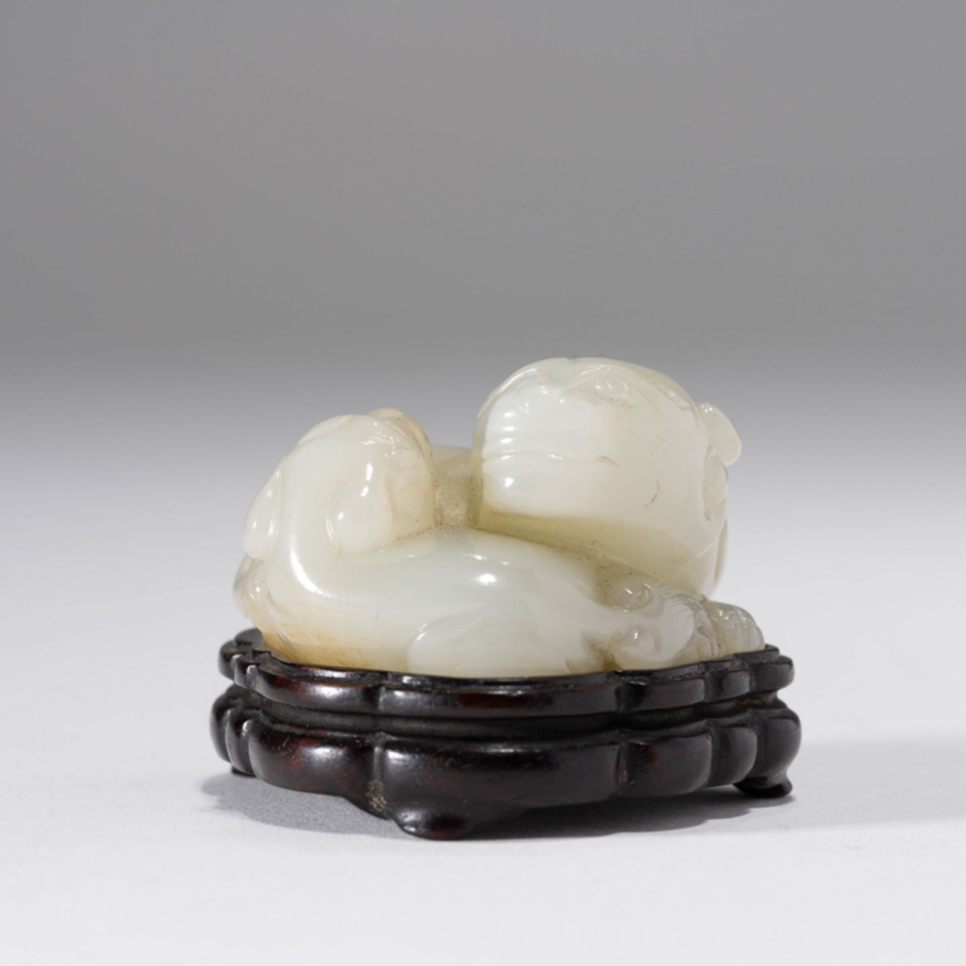 A CHINESE WHITE JADE BEAST-FORM WEIGHT