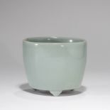 A CHINESE CELADON TRIPOD CENSER