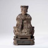 A CHINESE WOOD SEATED FIGURE