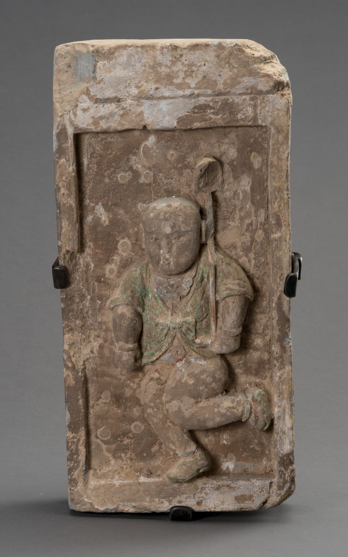 A TERRACOTTA BRICK DEPICTING A CHILD WITH STANDARD, SONG DYNASTY