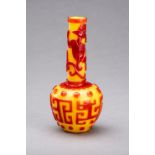 A CARVED RED-OVERLAY YELLOW GLASS BOTTLE VASE, QIANLONG MARK AND PERIOD