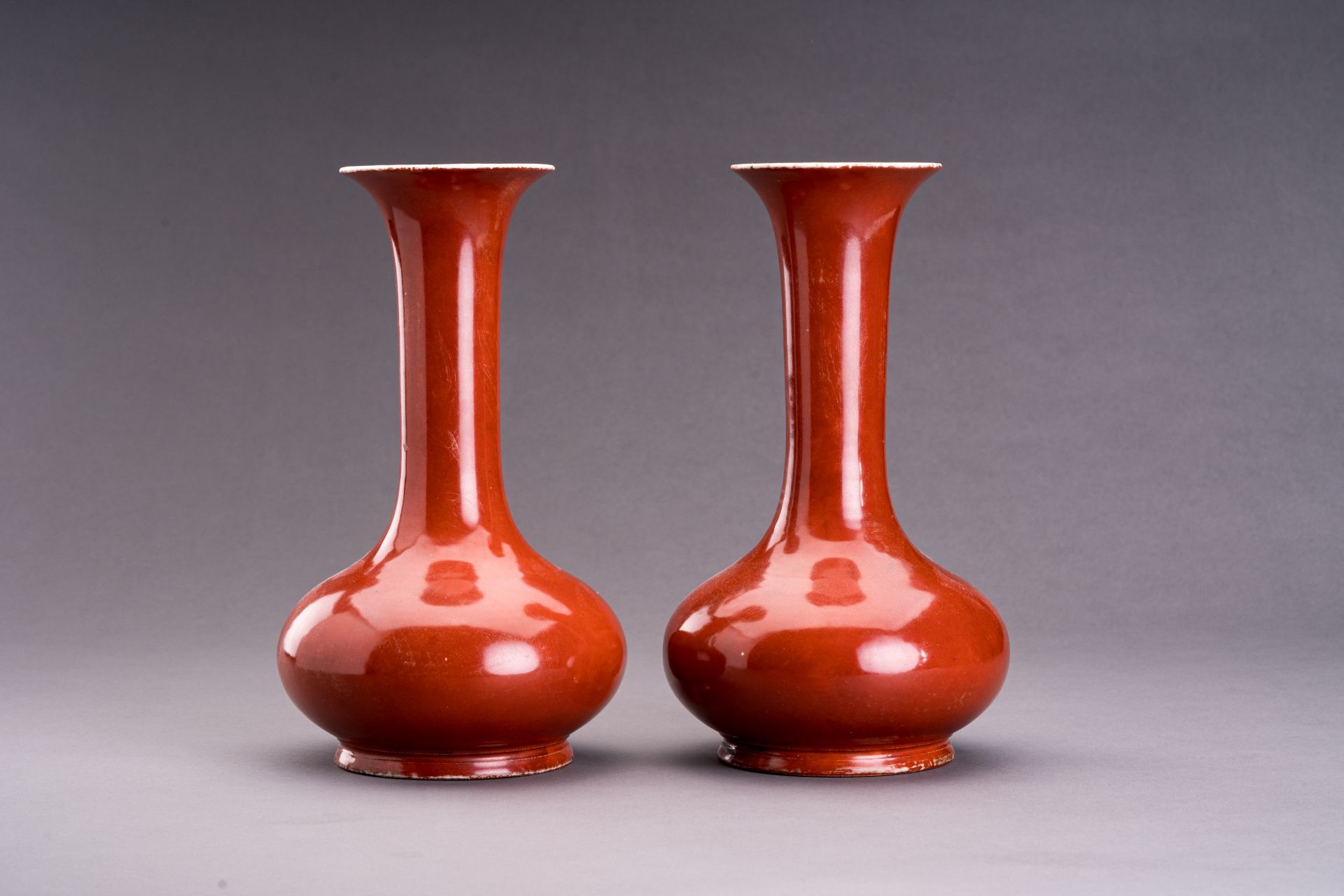 A PAIR OF A COPPER-RED PORCELAIN BOTTLE VASES - Image 3 of 6