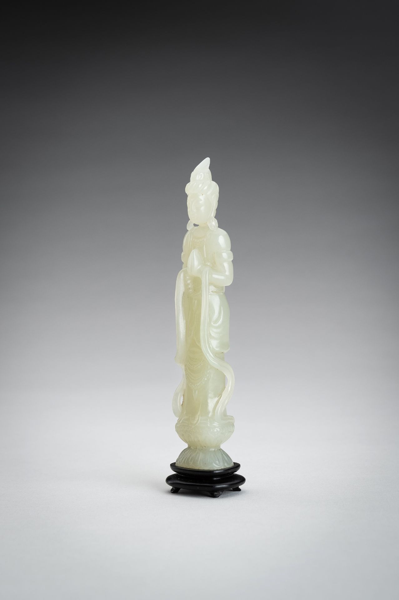 A PALE CELADON JADE CARVING OF A GUANYIN, 1900s - Image 5 of 11
