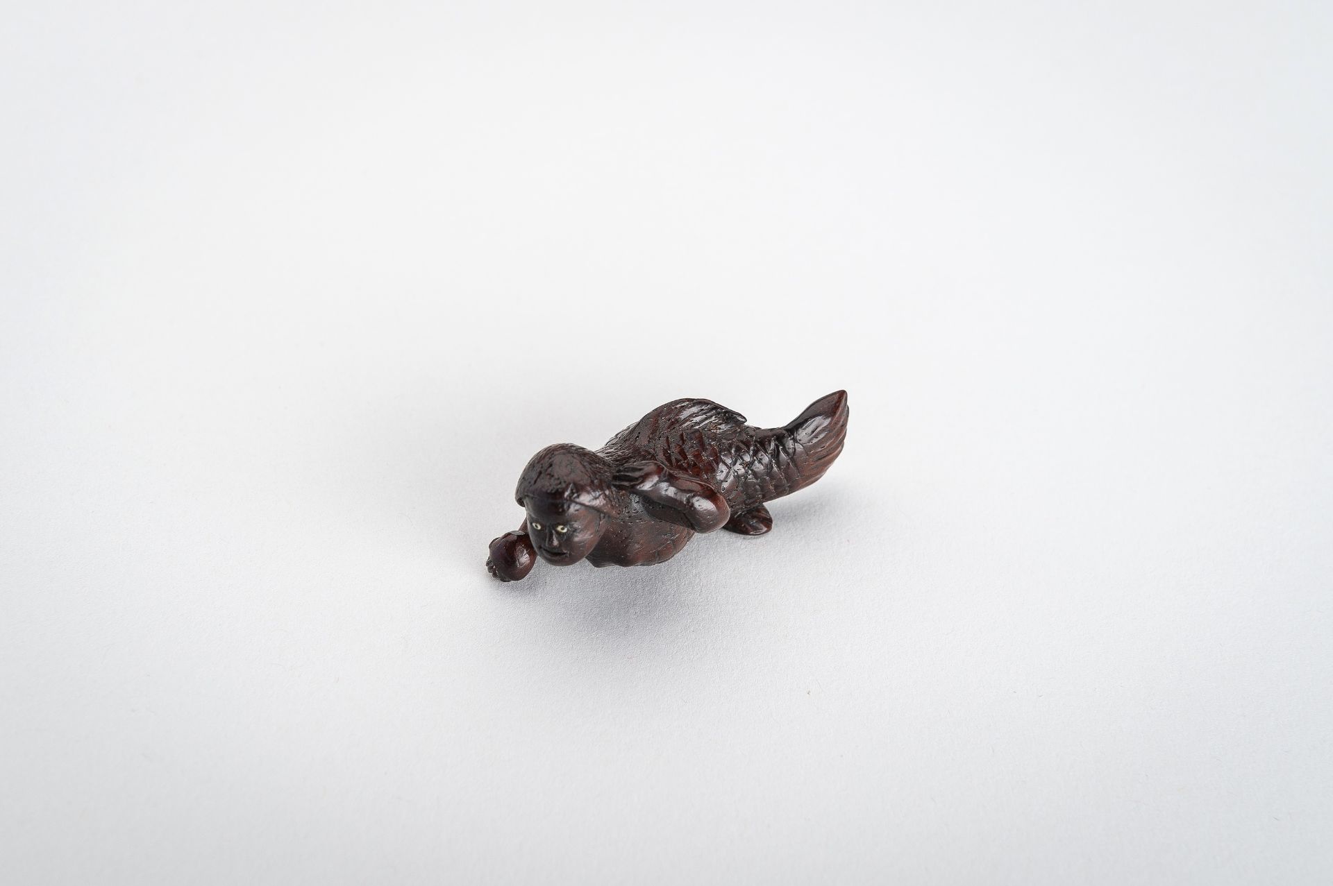 A WOOD NETSUKE OF A SWIMMING NINGYO (MERMAID) - Image 4 of 10