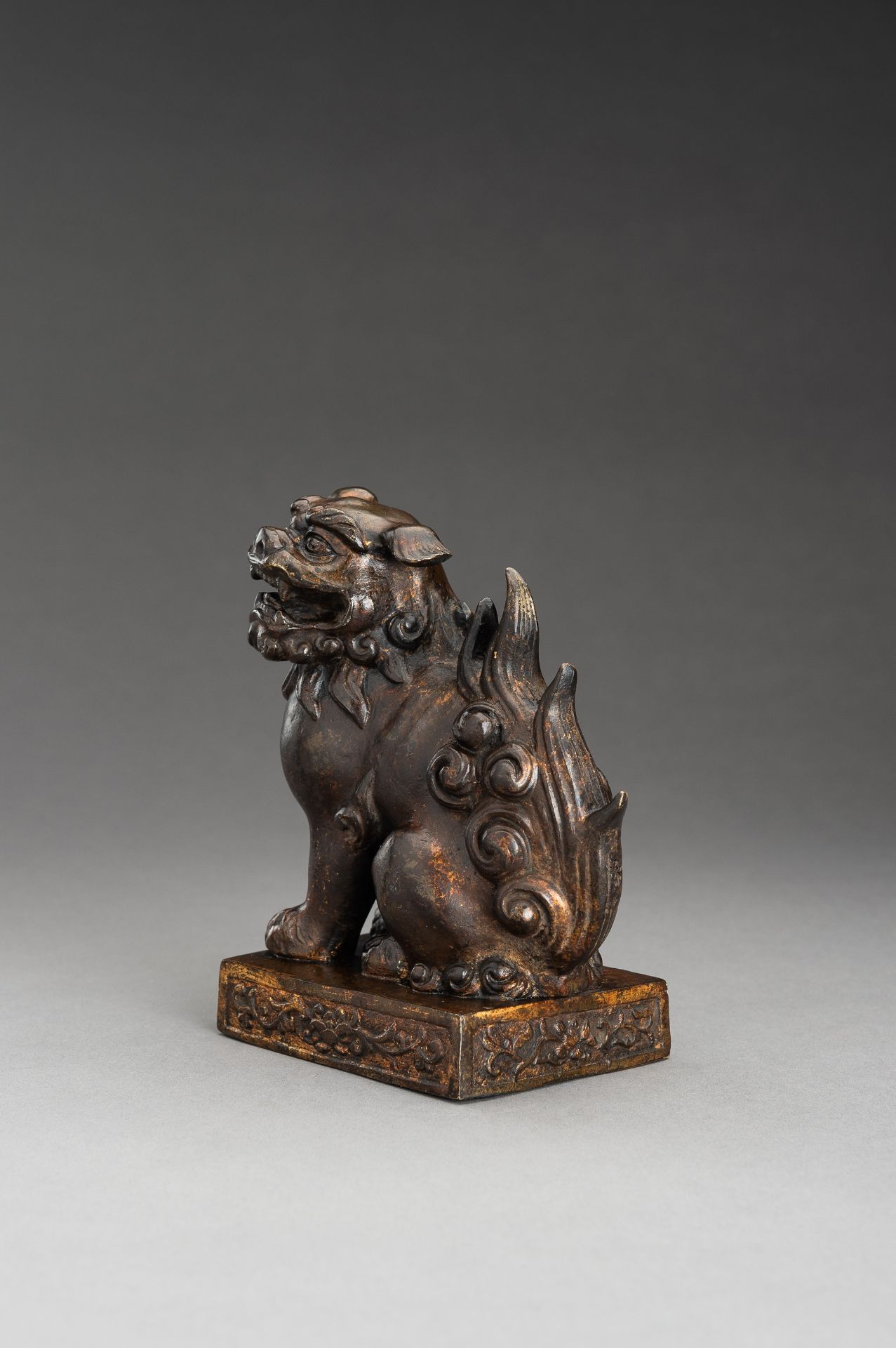 A LACQUER GILT BRONZE FIGURE OF A BUDDHIST LION, QING - Image 10 of 13