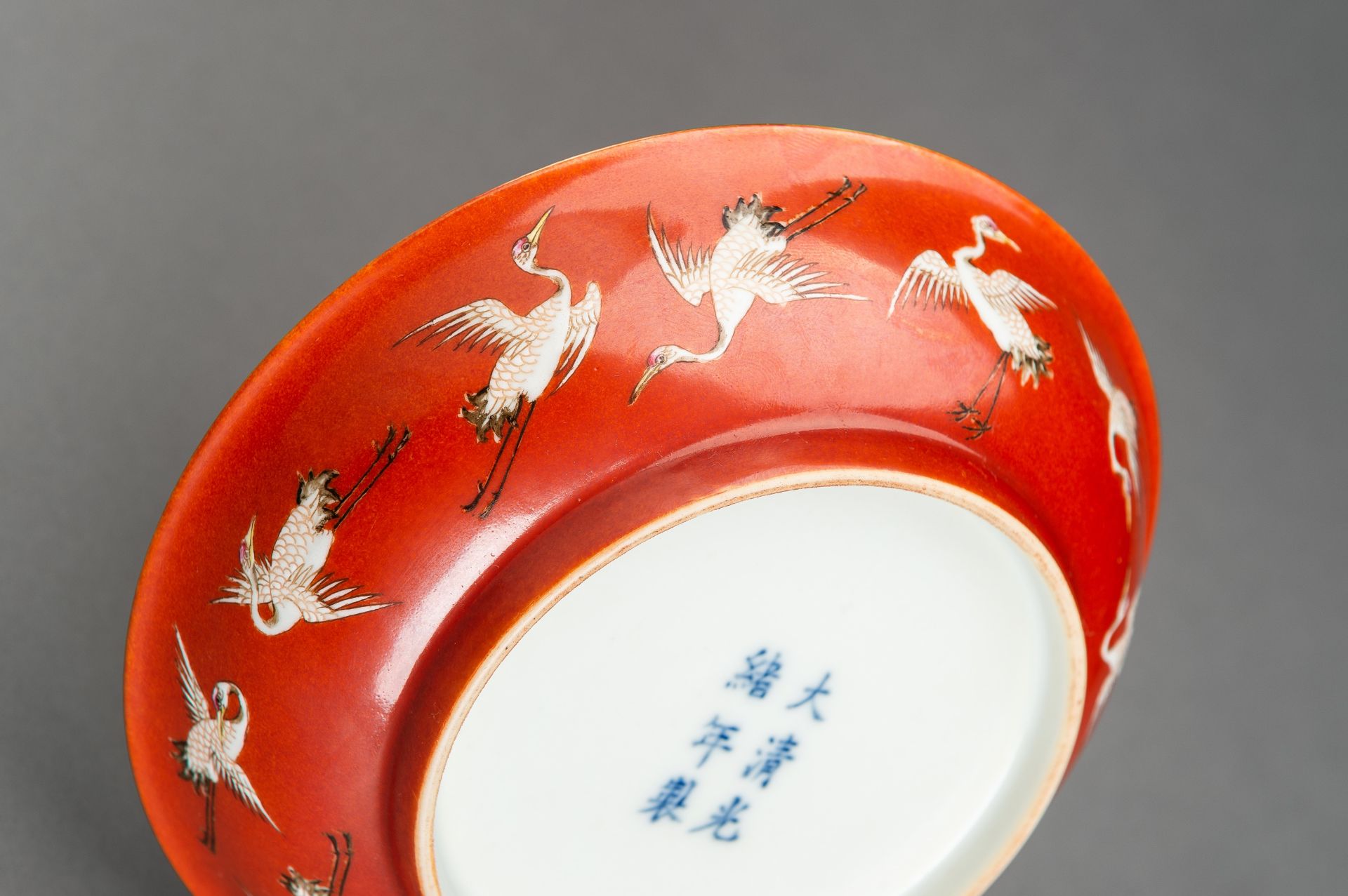 A PAIR OF RED GROUND 'BATS AND CRANES' SAUCER DISHES, GUANGXU MARK AND PROBABLY OF THE PERIOD - Image 8 of 13
