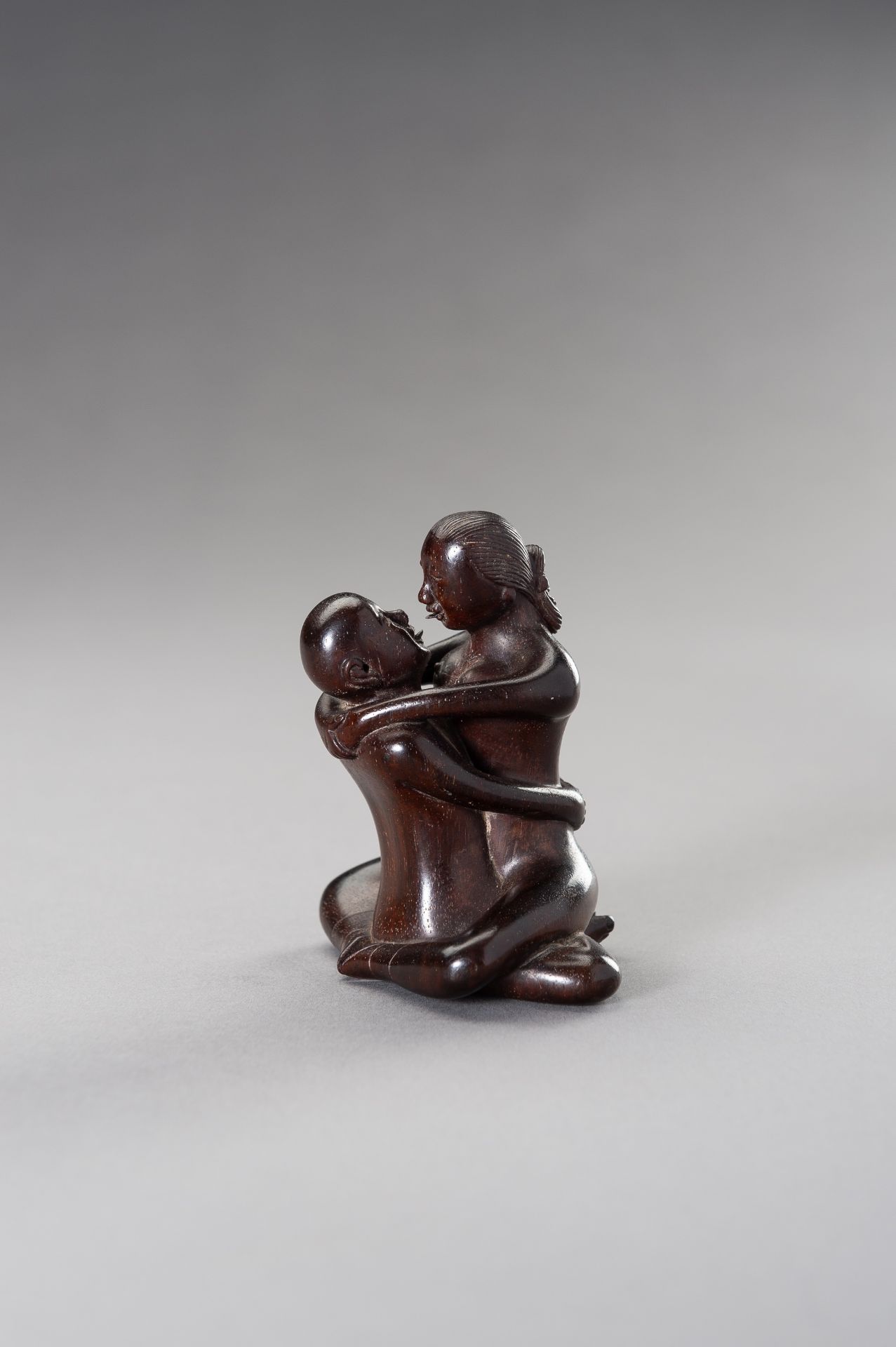 A ZITAN WOOD FIGURE OF A COUPLE IN EROTIC EMBRACE - Image 8 of 12