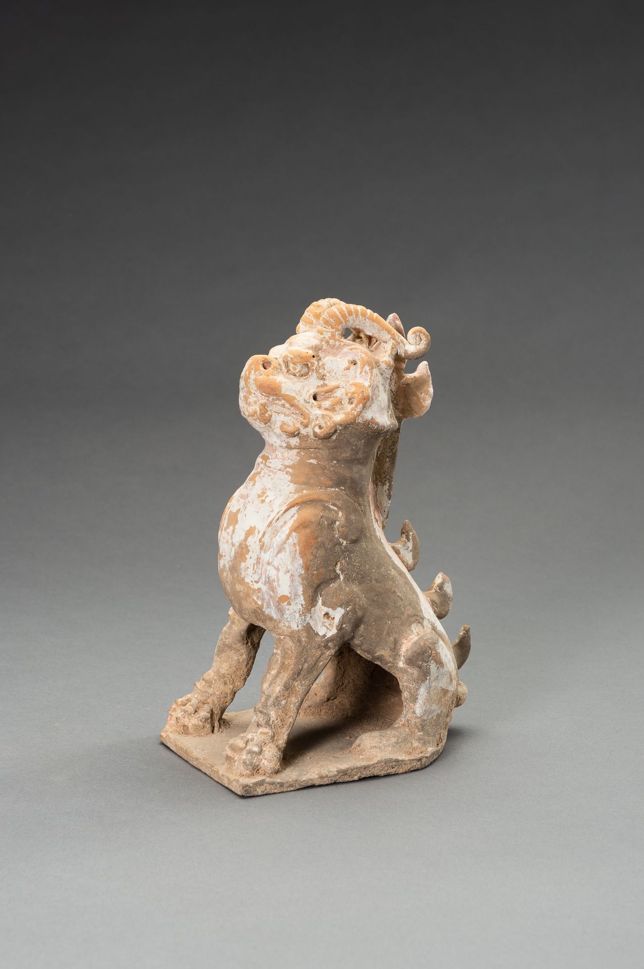 A POTTERY FIGURE OF A HORNED GUARDIAN BEAST, TANG DYNASTY OR EARLIER - Image 5 of 13