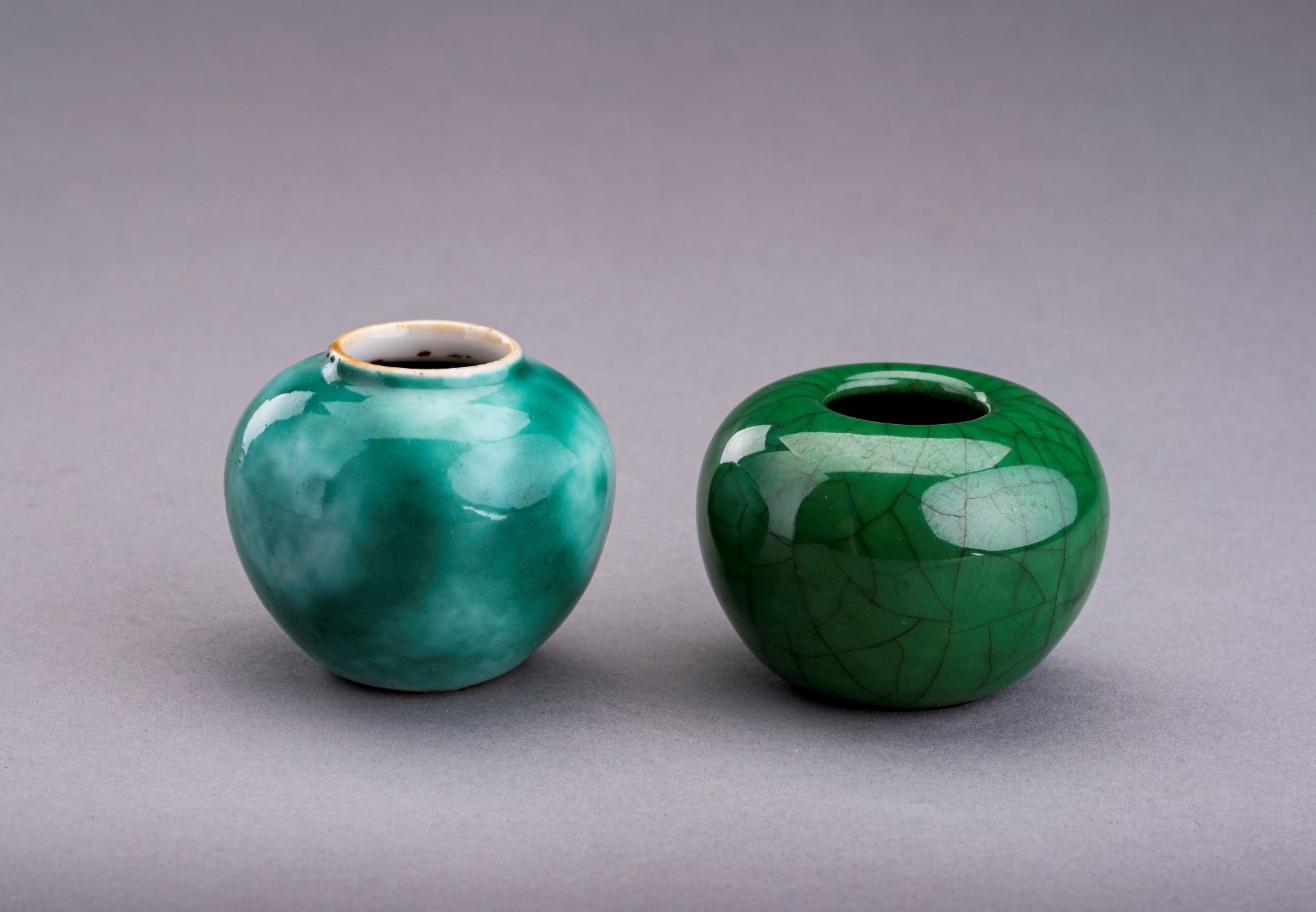 TWO MINIATURE GREEN GLAZED PORCELAIN POTS, c. 1920s